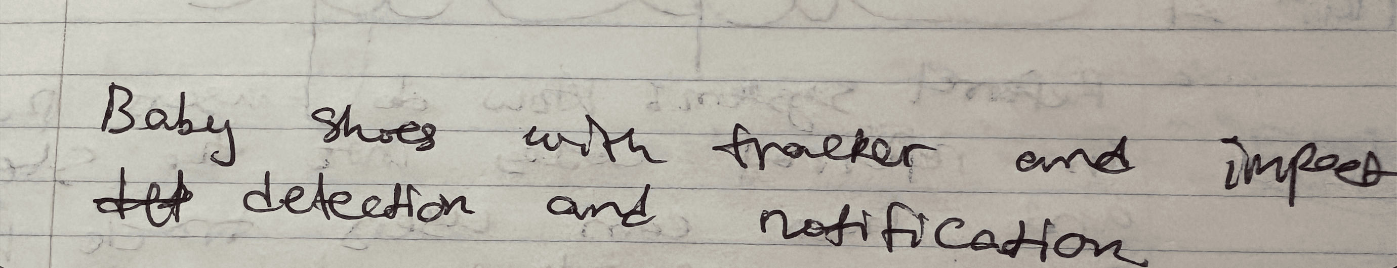 A handwritten notebook page reading: Baby shoes with tracker and impact detection and notification